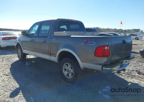 2002 Ford F-150 Lariat/Xlt z USA, uszkodzony, nr VIN 1FTRW08L22KC98708